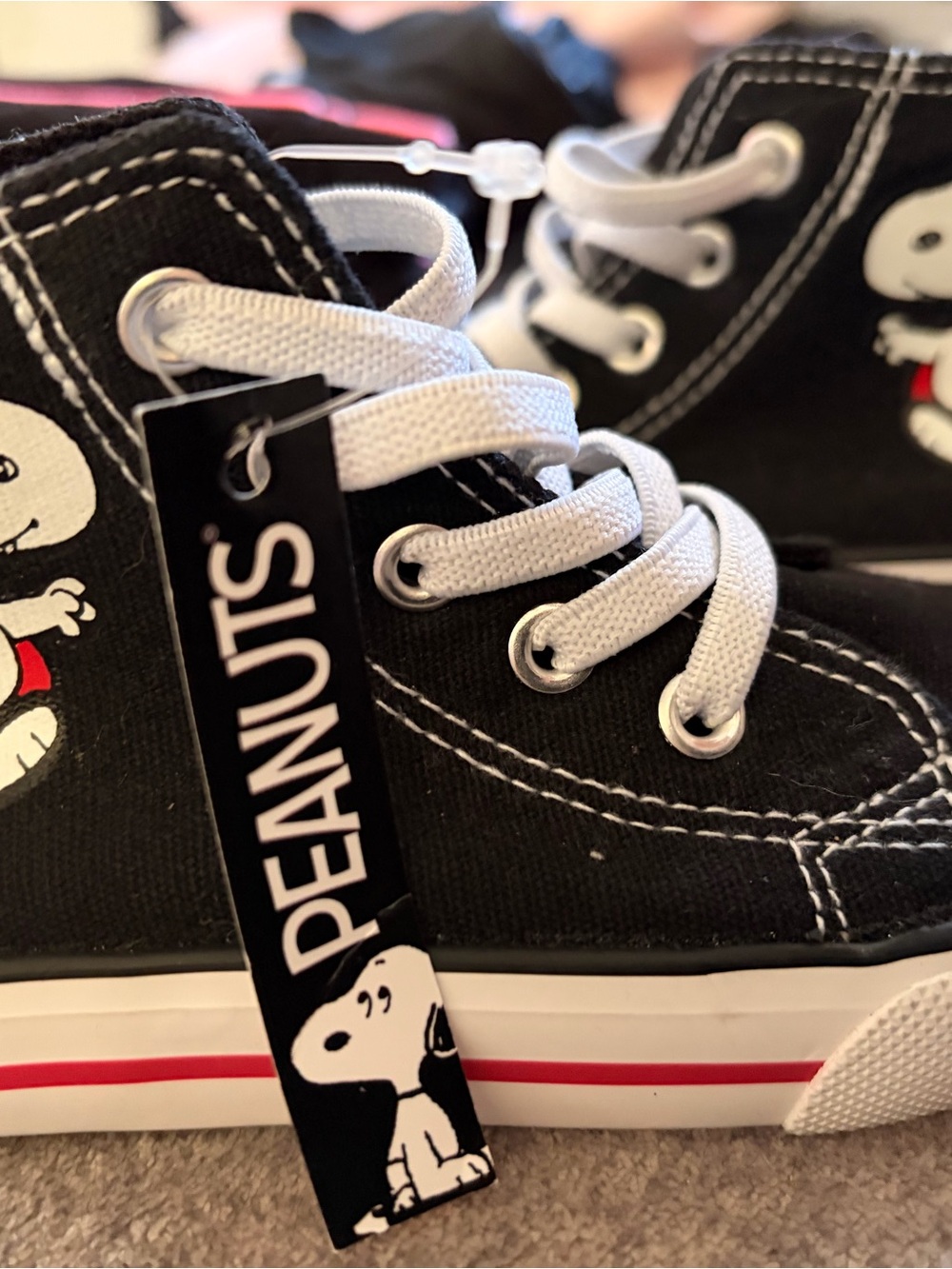 Peanuts Black High-Top Sneakers with White Laces and Red Stripe